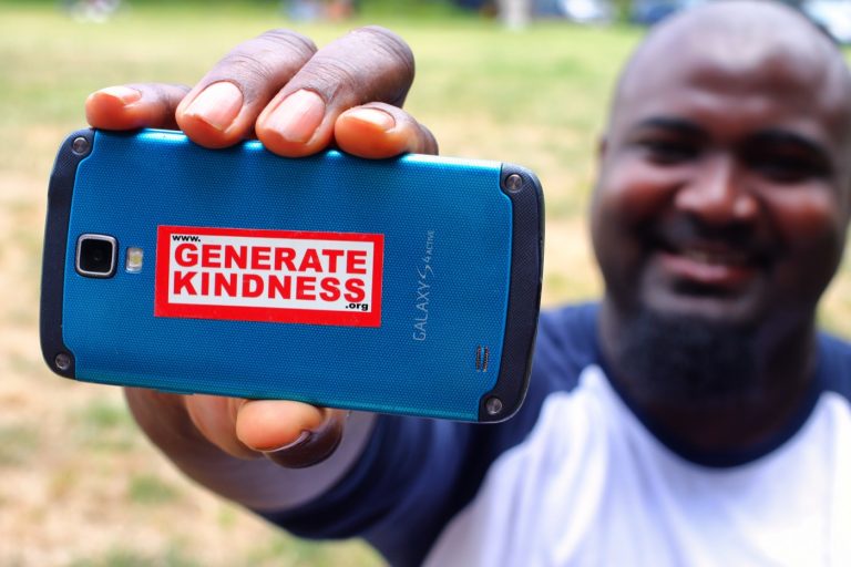 A Generate Kindness sticker in the wild