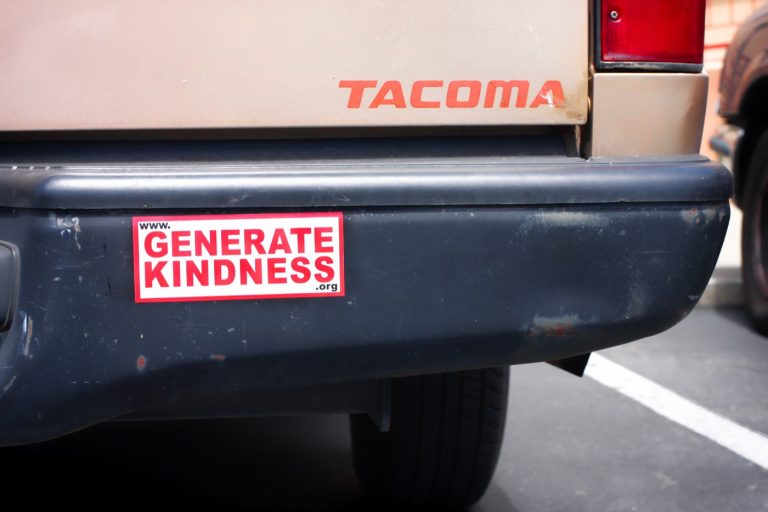 A Generate Kindness sticker in the wild